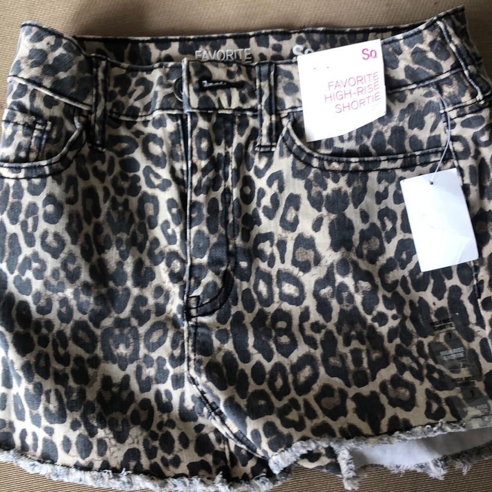 Brand new high rise size 7 leopard shorts .